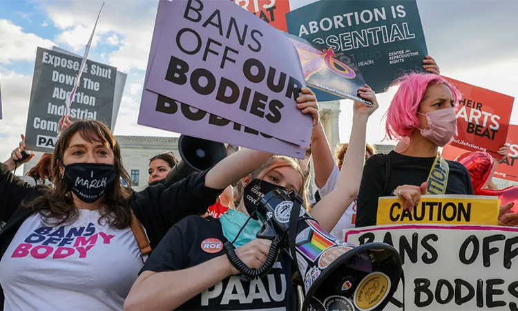 Pro-choice and anti-abortion campaigners demonstrate outside the US Supreme Court. Reuters