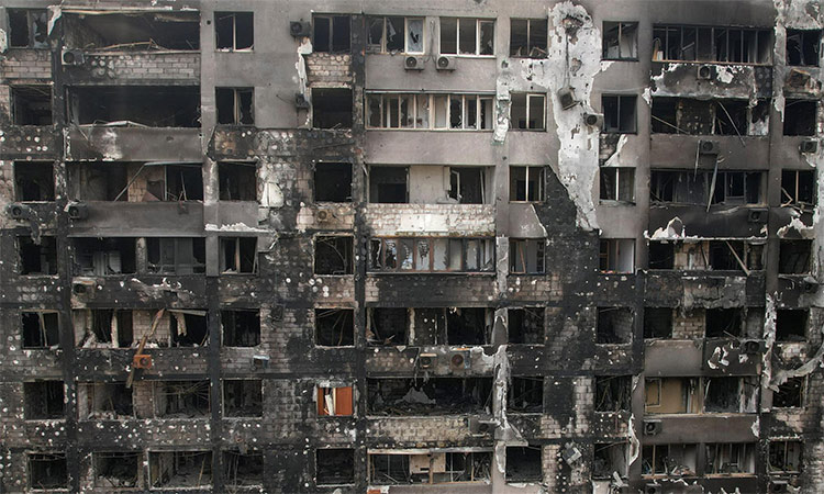 A view shows a residential building burnt during the Ukraine-Russia conflict in the southern port city of Mariupol, Ukraine. Reuters