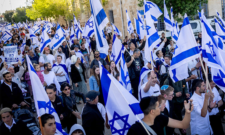 Israeli citizens take part in a flag march in the vicinity of the Al Aqsa Mosque.