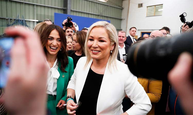 Sinn Fein's Vice President Michelle O'Neill, centre, welebrates with party colleagues after being elected in Mid Ulster at the Medow Bank election count centre in Magherafelt, Northern Ireland. AP