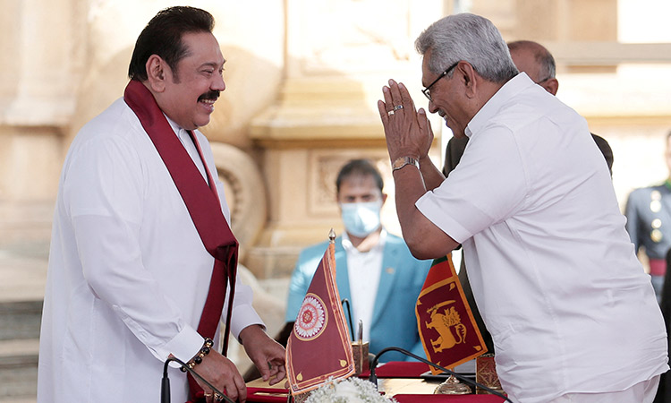 Sri Lanka’s former prime minister Mahinda Rajapaksa (left) and his brother, President Gotabaya Rajapaksa, are seen in this picture taken in Colombo, Sri Lanka, on Aug.9, 2020. File/Reuters