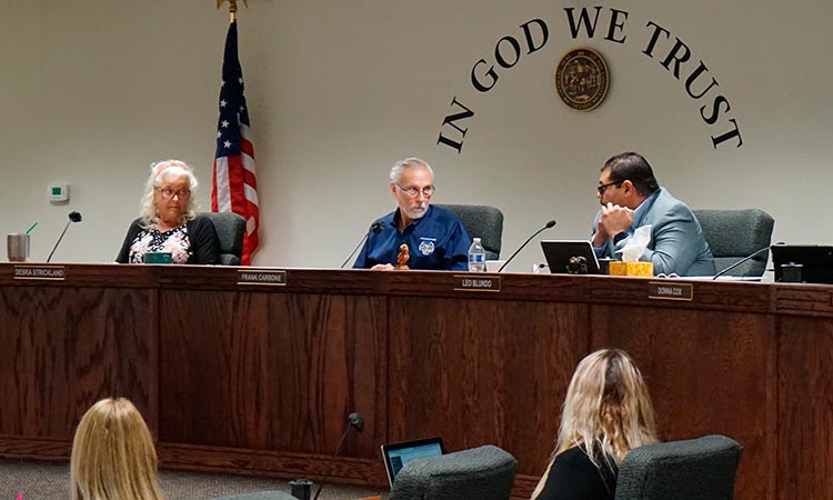 Nye County Commissioners Debra Strickland (left), Frank Carbone and Leo Blundo discuss appointing a new county clerk on in Pahrump, Nevada. File/Associated Press