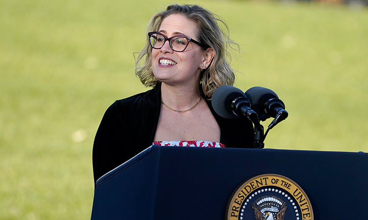 Kyrsten Sinema speaks before President Joe Biden signs the $1.2 trillion bipartisan infrastructure bill into law during a ceremony on the South Lawn of the White House in Washington. AP
