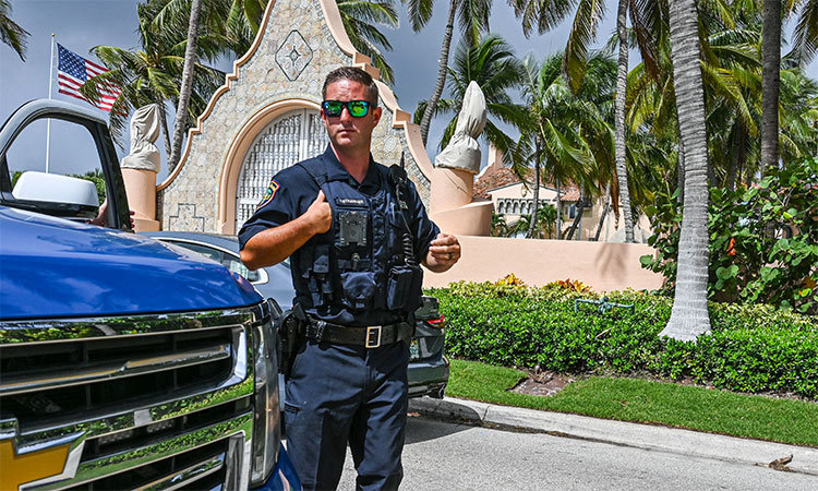 Local law enforcement officers are seen in front of the home of former President Donald Trump at Mar-A-Lago in Palm Beach, Florida. AFP