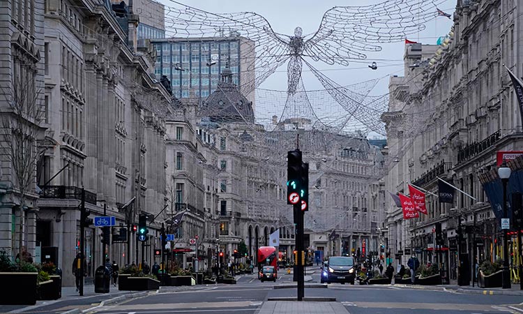 A near-deserted Regent Street is pictured in London on Boxing Day, December 26, 2020, as Londoners continue to live under Tier 4 lockdown restrictions. File/Tribune News Service