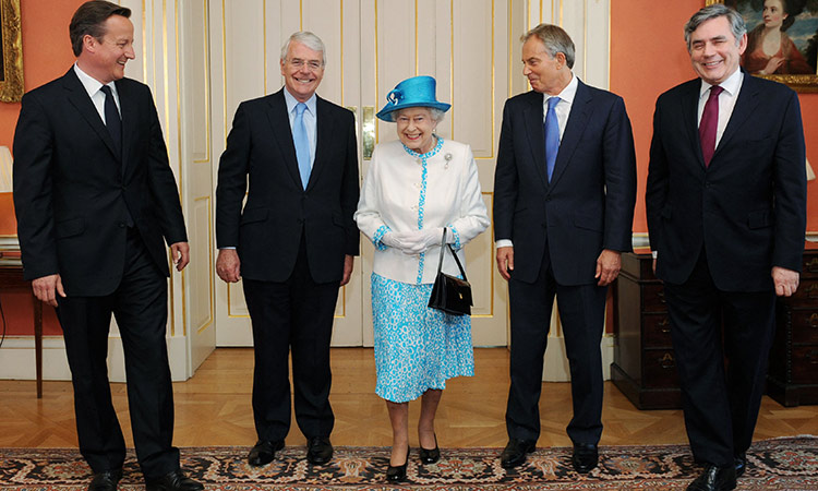 Queen Elizabeth II poses with David Cameron (left), John Major, Tony Blair and Gordon Brown for a photograph ahead of a Diamond Jubilee lunch hosted by Cameron at 10 Downing Street in London. File/AFP