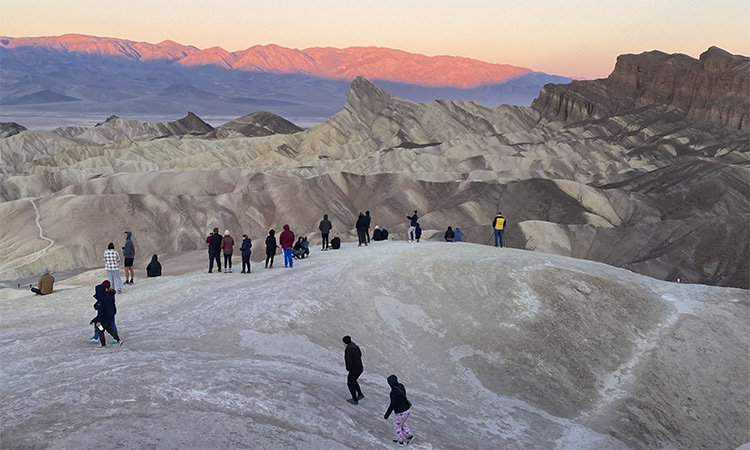 Visitors at Death Valley National Park gather at the Zabriskie Point for witnessing sunset. (Image via Twitter)