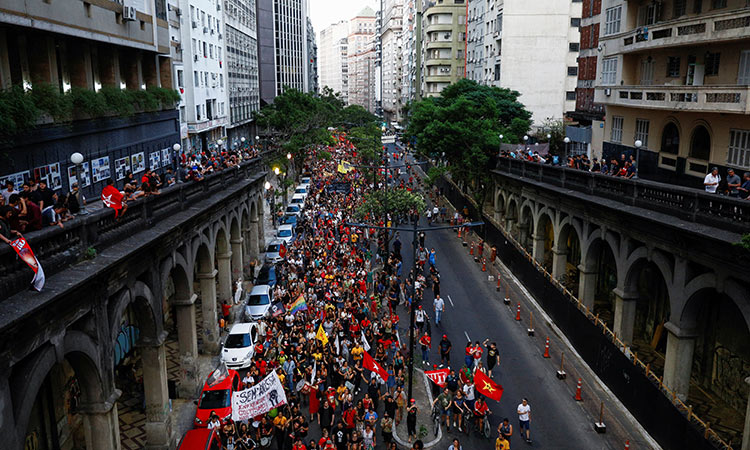 Pro-democracy demonstrators march after thousands of supporters of far-right former President Jair Bolsonaro stormed Brazil’s Congress, the Supreme Court and the presidential palace, in Porto Alegre on Monday. Reuters