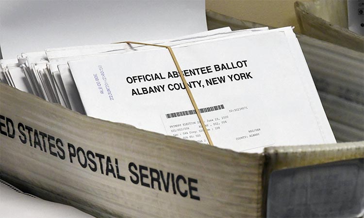 US postal votes await counting at an election office in New York. File/AP
