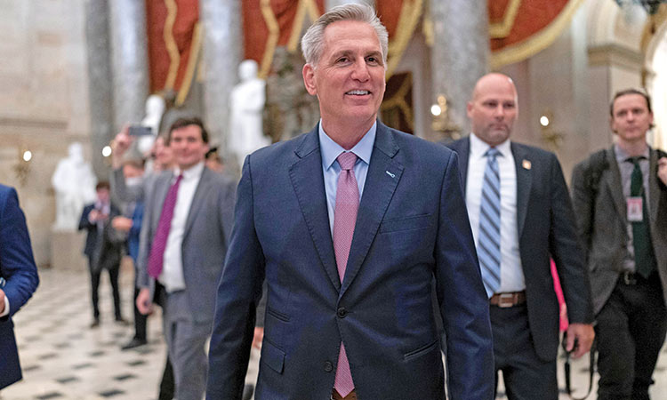 Newly-elected Speaker of the House Kevin McCarthy walks to his office after a contentious battle to lead the GOP majority in the 118th Congress, at the Capitol in Washington on Saturday.    Associated Press