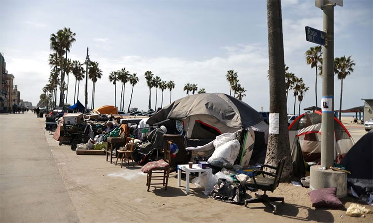 Homeless encampments line the boardwalk on Venice Beach in Los Angeles, California. Reuters