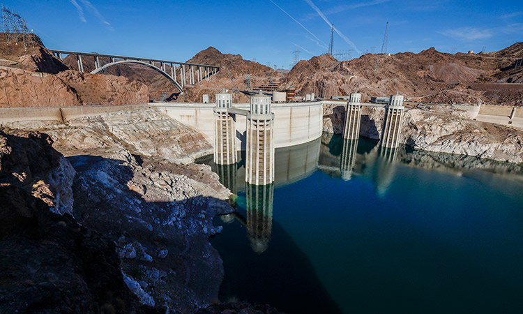 A view of the 395-foot Arizona intake towers (left) and Nevada intake towers in front of the Hoover Dam.     Tribune News Service