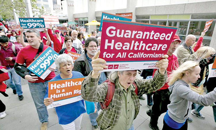 Supporters of single-payer health care march to the Capitol, in Sacramento, California.  File/Associated Press