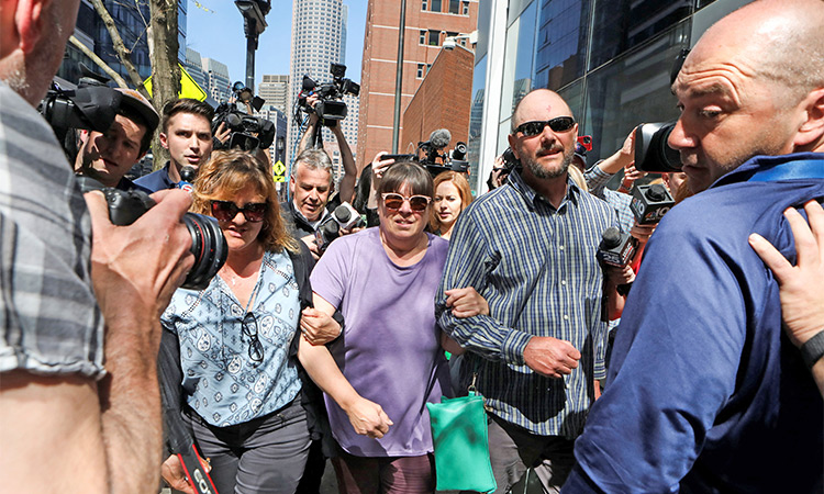 Relatives of  Jack Teixeira leave the John Joseph Moakley United States Courthouse, in Boston, Massachusetts, on April 14, 2023.  AFP