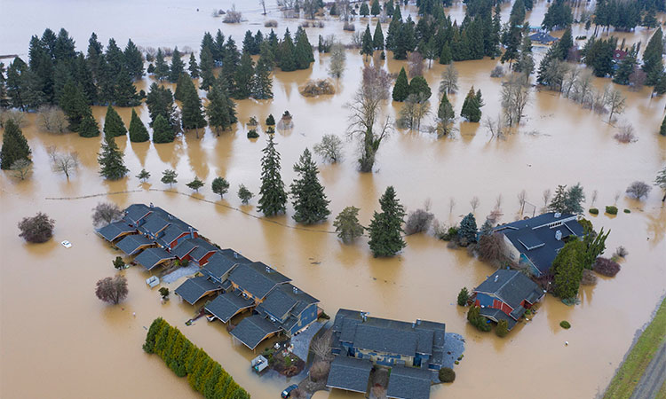 A residential cul-de-sac is covered in floodwaters after heavy rain in Chehalis, Washington. Reuters