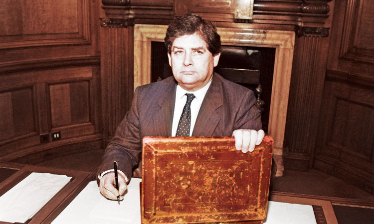 British Chancellor of the Exchequer Nigel Lawson at work with his budget box.   Tribune News Service