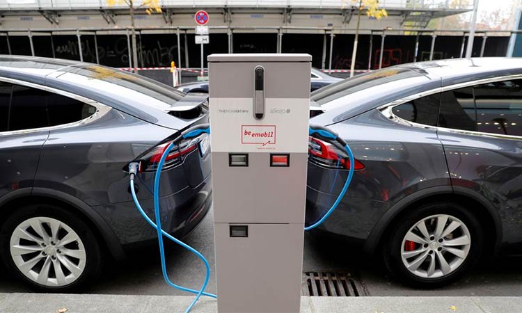 Tesla Model X electric cars recharge their batteries in Berlin, Germany. Reuters