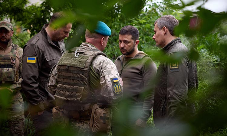 Volodymyr Zelensky talks with officers during his visit to the forward positions of the Armed Forces of Ukraine in the Vugledar-Maryinka defence zone, Donetsk region, on the occasion of the Marine Day, amid the Russian invasion of Ukraine. File/Agence France-Presse