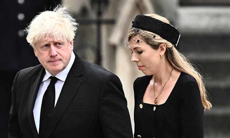 Former British Prime Minister Boris Johnson and his wife Carrie Johnson arrive at Westminster Abbey in London.     File/Agence France-Presse