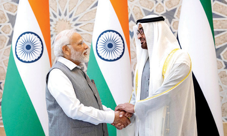 President Sheikh Mohamed Bin Zayed al-Nahyan (right) welcoms Prime Minister of India Narendra Modi at Qasr Al Watan in Abu Dhabi, on Saturday.  Agence France-Presse