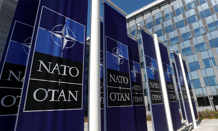 Banners displaying the NATO logo are placed at the entrance of new NATO headquarters in Brussels, Belgium. Reuters