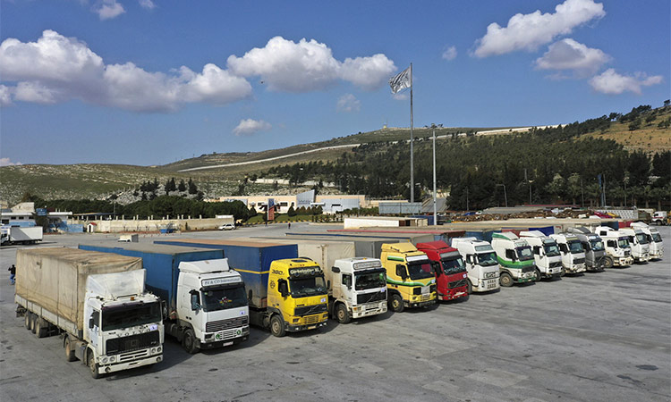 Trucks loaded with UN humanitarian aid for Syria at Bab al-Hawa border crossing with Turkey, in Syria’s Idlib province, back in February. AP