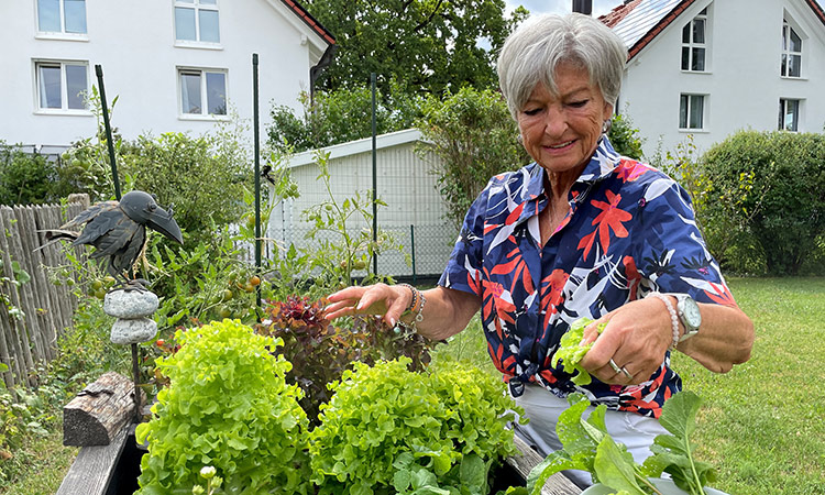 Irina Ernstberger, 66, patient of doctor Thomas Horbach, a specialist in surgery, visceral surgery and nutritional medicine, poses in her garden in Haar, Munich, Germany.   Reuters