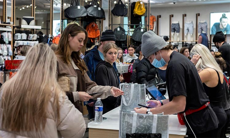 Shoppers buy different items at a mall in New York.