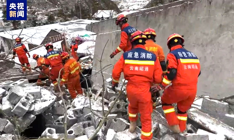 Rescuers search for survivors in Zhenxiong county, Southwest China's Yunnan province.