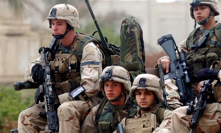 US Army snipers of the 1-22 Infantry division sit on their humvee as they leave the military base in Tikrit, Iraq. File/AP 
