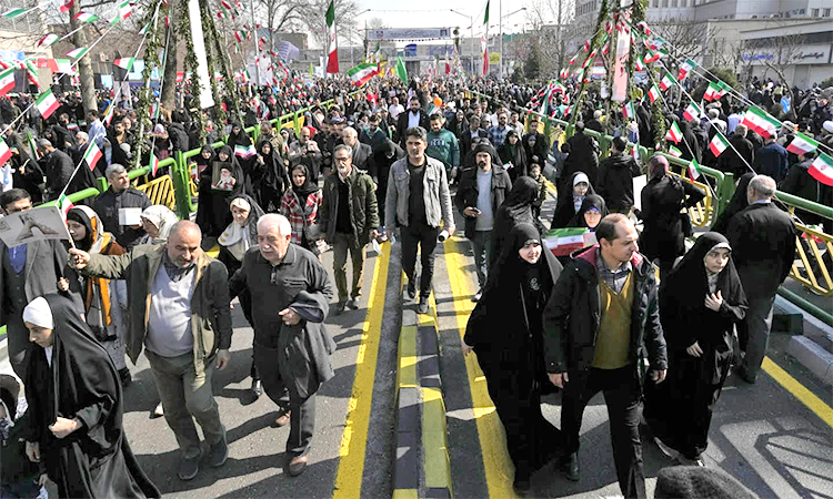 Iranians attend the annual rally commemorating the 1979 Islamic Revolution at the Azadi (Freedom) St. in Tehran. AP