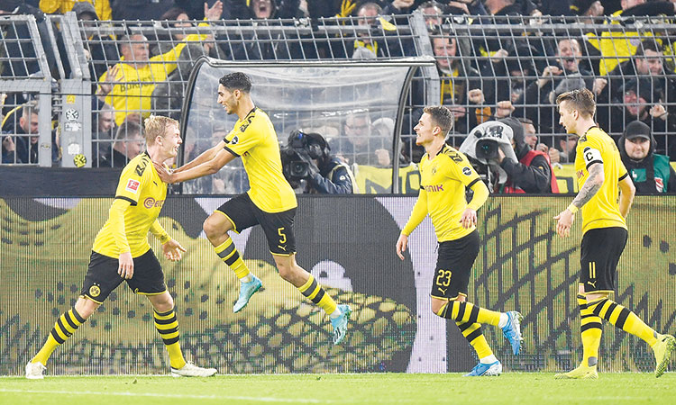 Dortmund go level with Bayern after win over leaders Gladbach