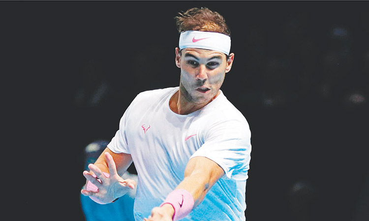 Nadal storms back against  Medvedev to  keep ATP Finals  dream alive