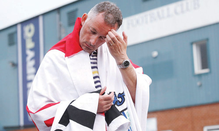 Fans in tears as historic Bury turfed out of League and FA Cup