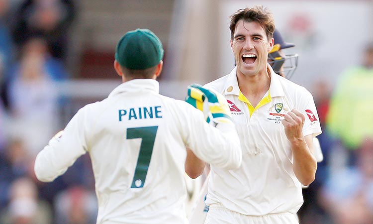 Cummins stars  as Australia  clinch Ashes  with fourth  Test triumph