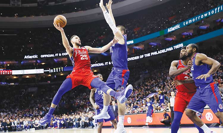 Simmons scores triple double  to power Sixers past Clippers