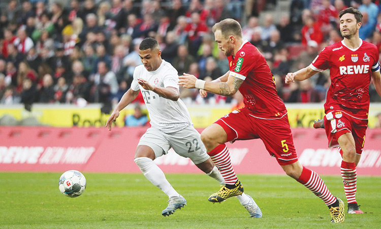 Gnabry shines as Bayern regain top spot with Cologne romp ...