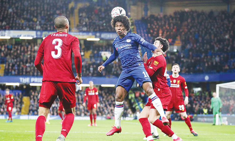 Chelsea ease into FA Cup quarters with leaders Liverpool romp