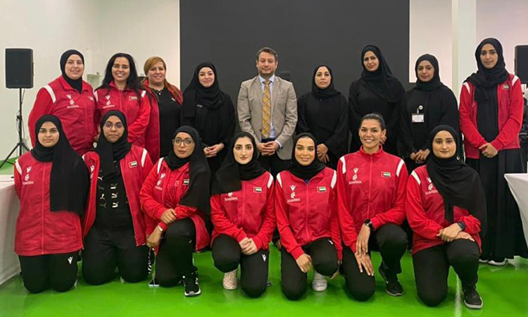 Athletes and coaches pose for a picture with Fagr Kassim, Fatima Ahmed Saleh and other officials of the  Sharjah Women’s Sports Foundation at the end of the workshop.