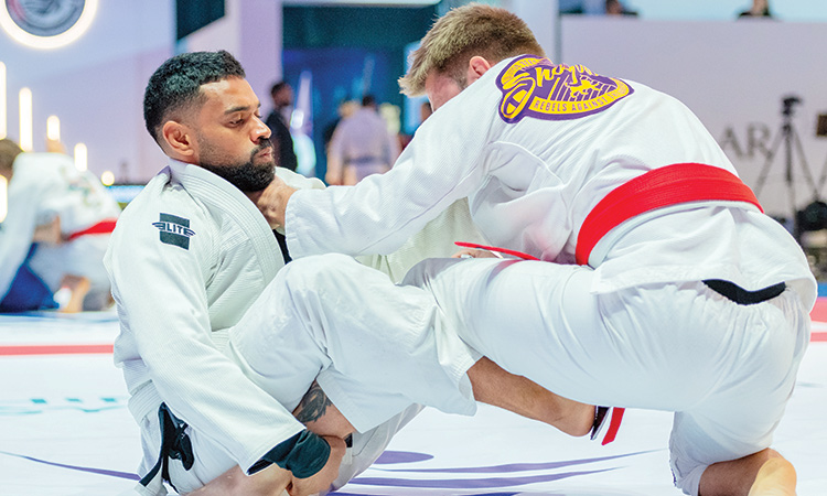 Participants in action during the amateur category competition at Abu Dhabi World Professional Jiu-Jitsu Championship.