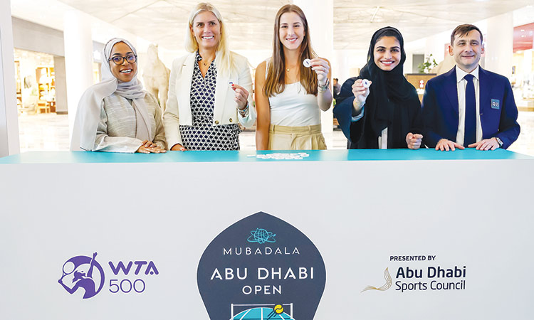 From left: Umayma Rajab Mohamed, Vickie Gunnarsson, Belinda Bencic, and Nouf Ali pose for a picture after the draw.