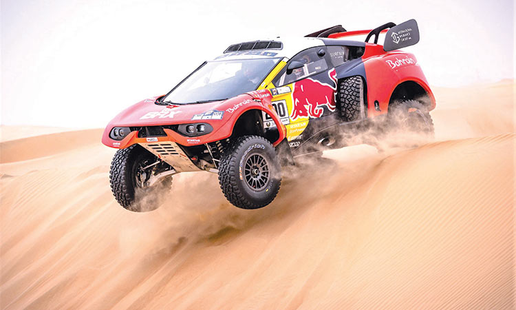 Sebastien Loeb steers his car along with co-driver Fabian Lurquin during the fourth stage of the Abu Dhabi Desert Challenge.
