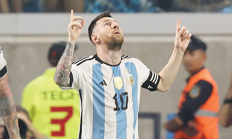   Argentina’s Lionel Messi celebrates after scoring a goal against Curacao during their match on Tuesday.  Agence France-Presse