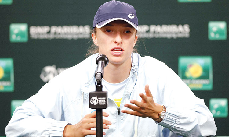 Iga Swiatek speaks during a press conference at the Indian Wells Tennis Garden.  Agence France-Presse