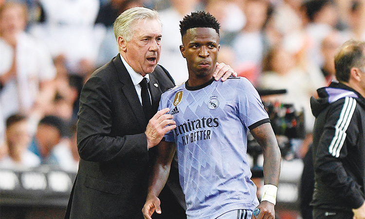  Real Madrid’s Carlo Ancelotti tries to pacify Vinicius Junior after the incident during their Spanish League match against Valencia. Reuters