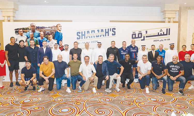 Khaled Jasim Al Midfa, Nabil Ashour, Steve Crane, Abdullah Arif, dignitaries and football stars pose for a picture after the press conference.