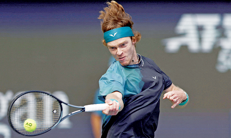 Andrey Rublev returns the ball to Arthur Cazaux during their Dubai Duty Free Tennis Championships match on Wednesday. Associated Press