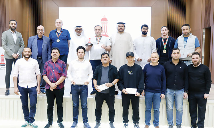 Winners with Imran Abdullah Al Nuaimi, Hisham Al Taher, Rajai N Al Susi and other dignitaries during the presentation ceremony.