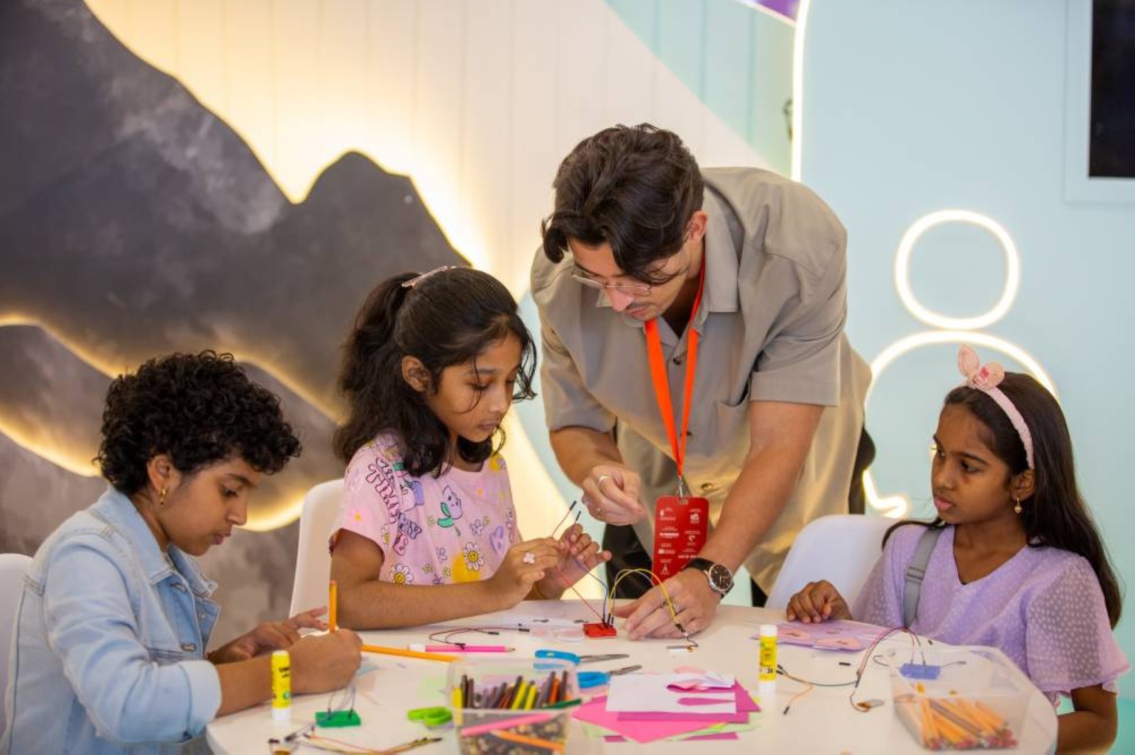 Young inventors shine with glowing robot creations