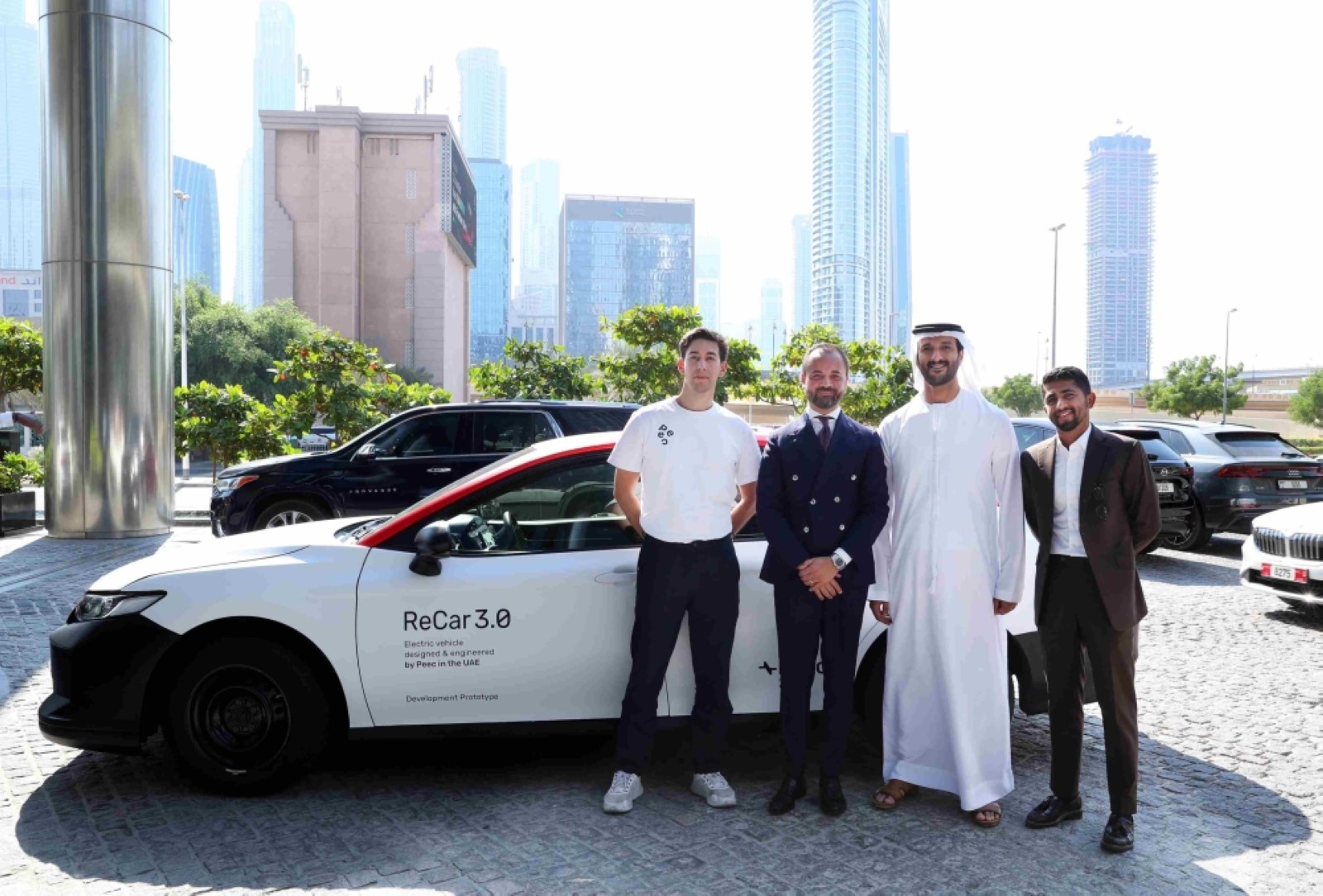 Abdulla Bin Touq with the officials  of  Peec Mobility in Abu Dhabi.